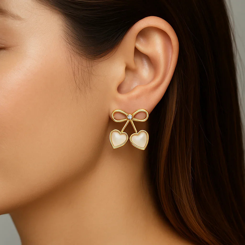 Miyaara Golden Bow Heart Earrings with Crystal Accent - Miyaara