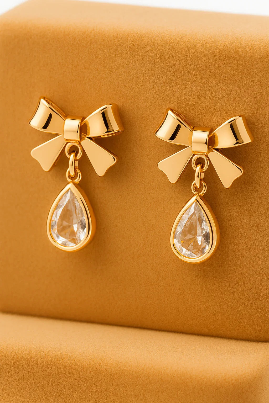 Miyaara Gold Bow Drop Earrings with Crystal Teardrop