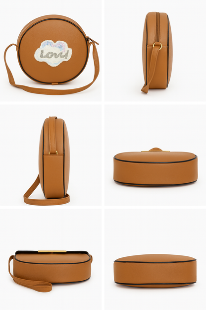Miyaara Round Tan Sling Bag with Embroidered Patch